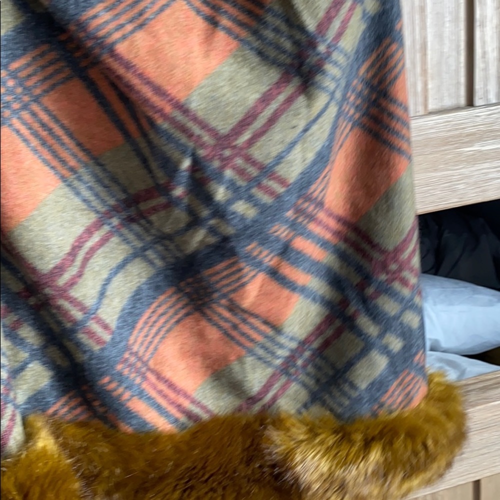 100%wool with faux fur trim